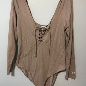 Pink body suit